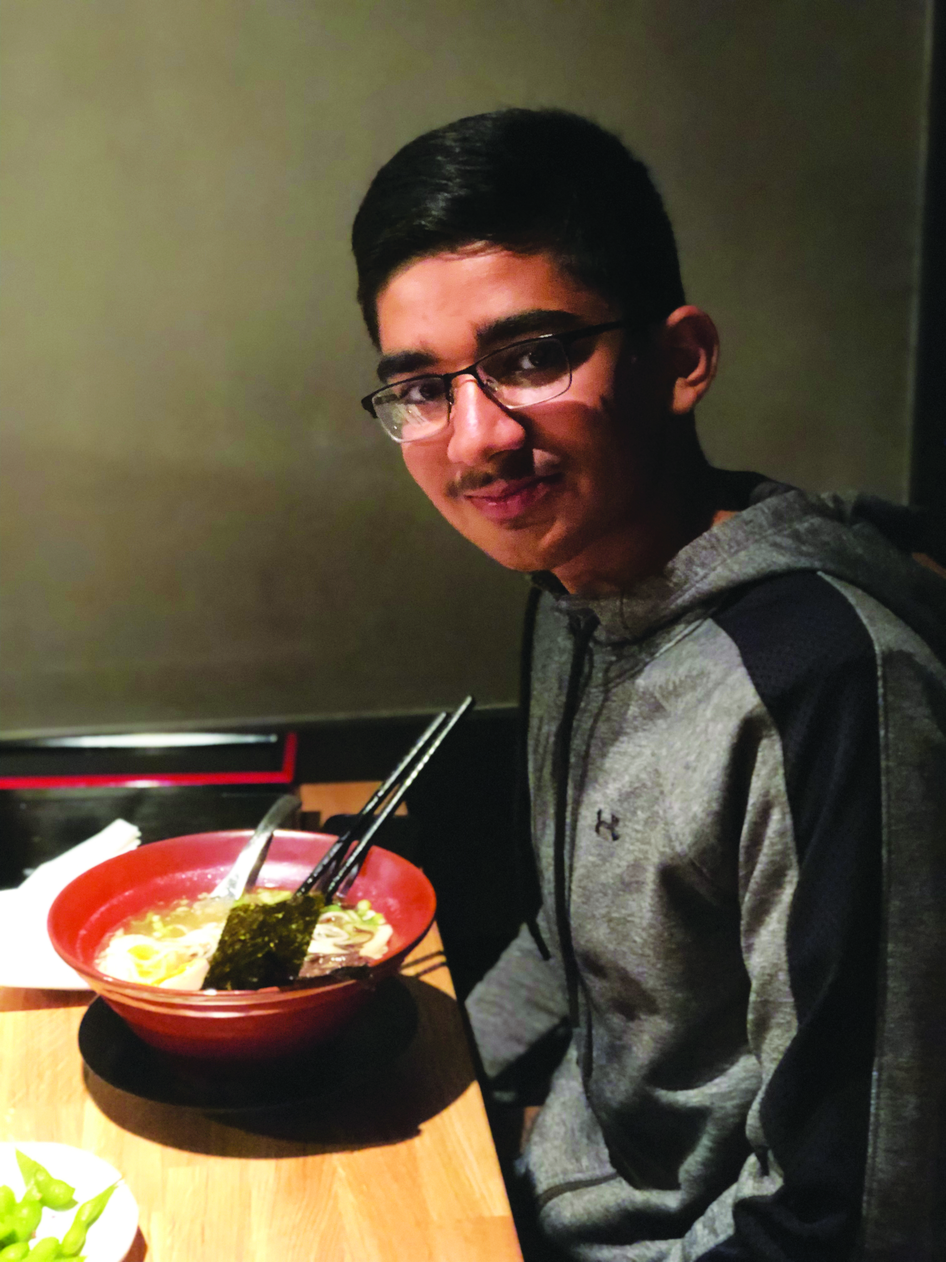 Picture of the reporter, Vedant, with his Vegan Ramen.