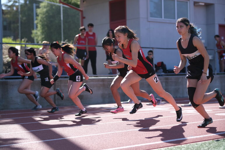 Track and field breaks school records